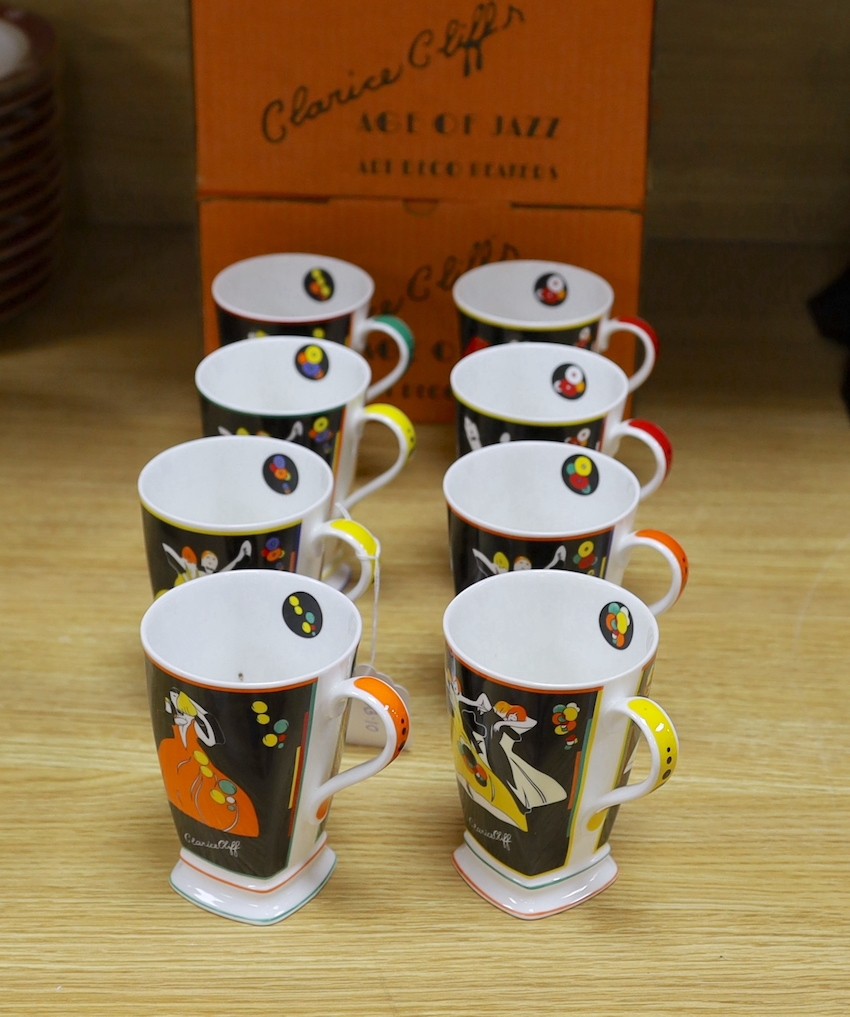 Eight Clarice Cliff limited edition ‘Age of Jazz’ mugs - Charleston, Fascinating Rhythm, Strike Up The Band, Putting On The Ritz, High Society, On The Town, Cheek To Cheek and Shall We Dance. 12cm tall, boxed.